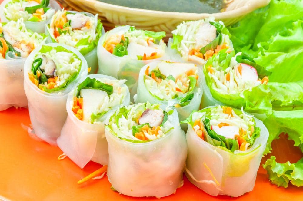 Soft pho noodles are rolled around stir-fried beef, lettuce, and herbs, then dipped in light fish sauce–a fresh, light snack or appetizer.